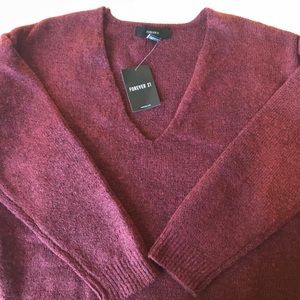 Oversized maroon v-neck sweater